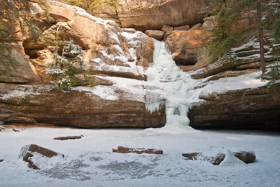 Scenic Cedar Falls and sandstone cliffs in Hocking Hills, Ohio