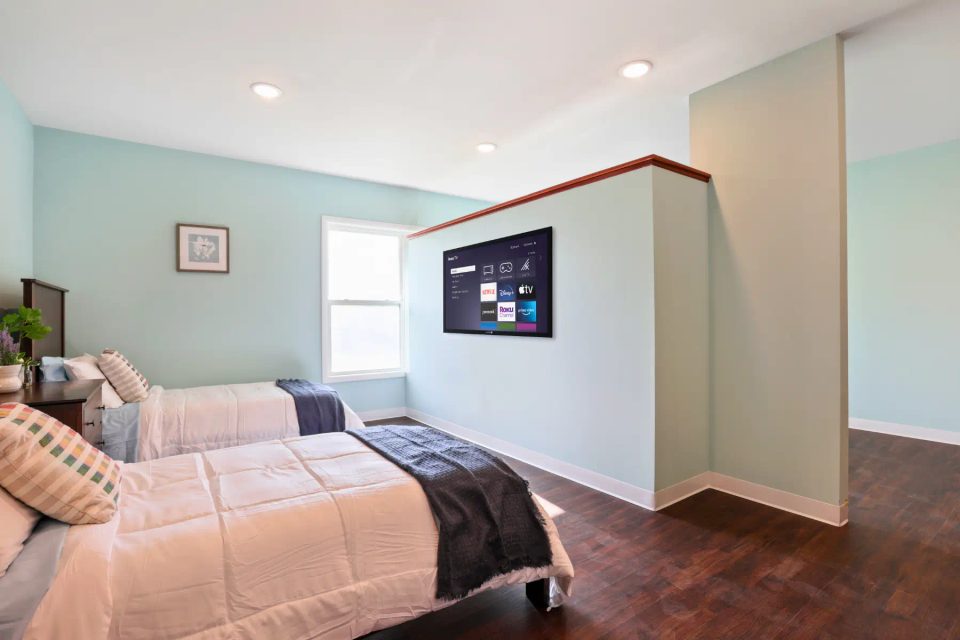 Arista Recovery Ohio: Inpatient residential bedroom suite with flat screen television in Hilliard