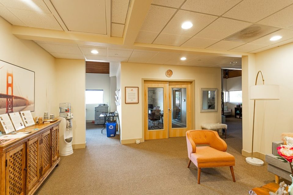 Golden Gate Recovery: Suite 220 reception and waiting lounge with Golden Gate Bridge artwork