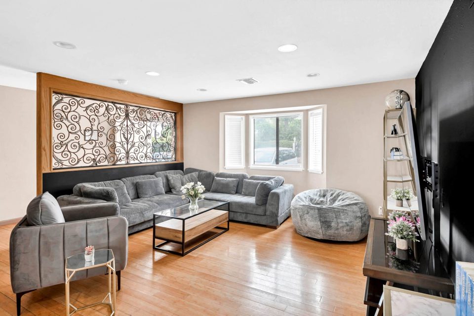 Northridge Addiction Treatment Center: Main residential living room with sectional seating at the Northridge campus