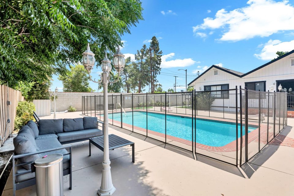 Northridge Addiction Treatment Center: Heated outdoor swimming pool and shaded poolside lounge patio