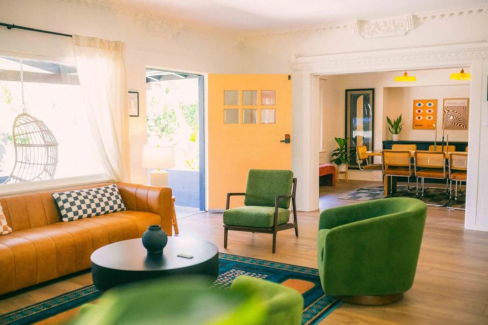 Numa Recovery Centers: Sunlit sitting lounge and open dining flow inside the NuMa residence